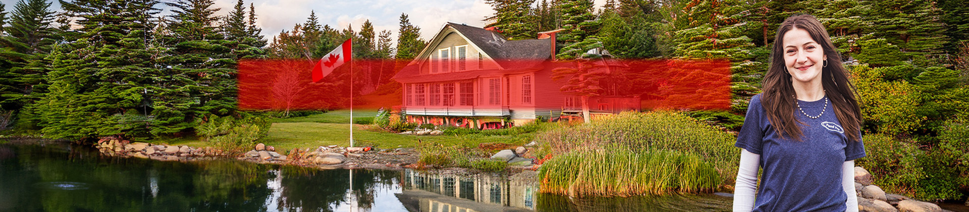 A spring pond in canada, with a house by the lake and can-air aeration in the pond.