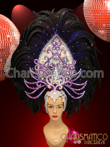 Tall arrow-shaped purple feather headdress with silver, mirrors, and crystals