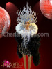 Black mini-dress and boa with white necklace, backpack and headdress