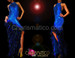 High neck royal blue sequined pageant gown with feathered skirt