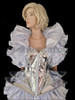 Three Piece Silver Set Featuring Ruffled Skirt, Shrug, And Gaga Corset