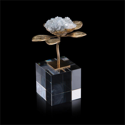 A celestite crystal bloom appears from a cast brass branch and are mounted on a crystal clear cube. John Richard