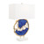 The Fondere Table Lamp is a stunning work of abstract art that introduces vivid hues and ethereal shapes to an interior space. Crafted from metal with an enamel coating, the piece takes on a circular shape with gorgeous shades of blue intermingling with opulent strands in a Champagne Gold finish, additionally showcasing a masterful use of negative space that greatly enhances any décor. The piece gently rests atop a rectangular base of white marble, accented with brass hardware and matching puck finial. John Richard