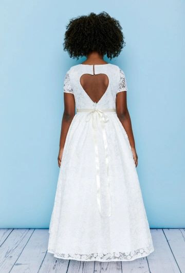 Rosebud Fashions Flower Girl Style 5141 is a full length dress with a delicate lace overlay