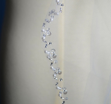 https://cdn11.bigcommerce.com/s-08555/images/stencil/357x476/products/46586/114114/Ansonia-Bridal-veil-style-164-Detail__63146.1649483868.jpg?c=2