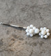Erica Koesler A-5689 - 1 ¼” of two 4 & 6mm Mother Of Pearl shaped flowers on a hairpin