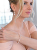 Mariell Ivory Pearl and Cubic Zirconia Bridal Bracelet and Earrings Set in Rose Gold 4580BS-I-RG