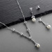 Cubic Zirconia Trillion and Light Ivory Pearl Bridal Necklace and Earrings Set
4648S-I-S
