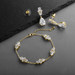 CZ Multi-Shape 14K Gold Plated Bracelet and Earrings Set with Adjustable Chain
4592BS-G
