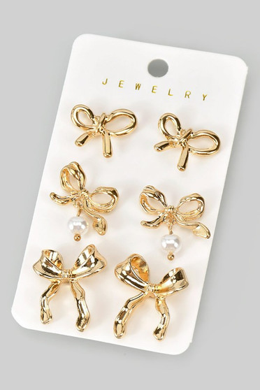Three Pairs Of Bow Studs With Pearl