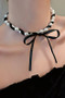 Pearl And Satin Bow Wrap Choker Necklace
