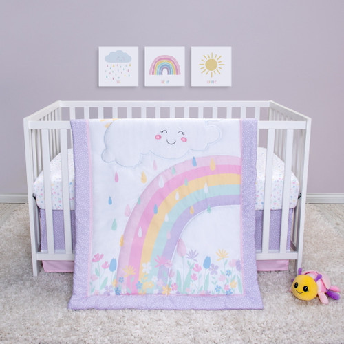 Sammy And Lou Rainbow Showers 4 Piece Crib Bedding Set. Rainbow, Cloud And Flower Print In Pink, Blue, Yellow, And Purple.