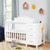 Davinci Charlie 4-in-1 Convertible Mini Crib & Changer In White