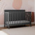 Storkcraft Alpine 5-in-1 Convertible Baby Crib Gray