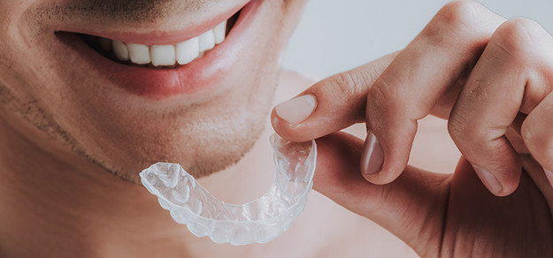 ​Retainer vs Night Guard for Teeth Grinding