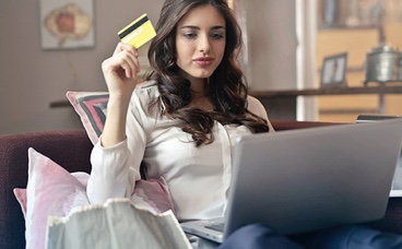 Woman holding credit card