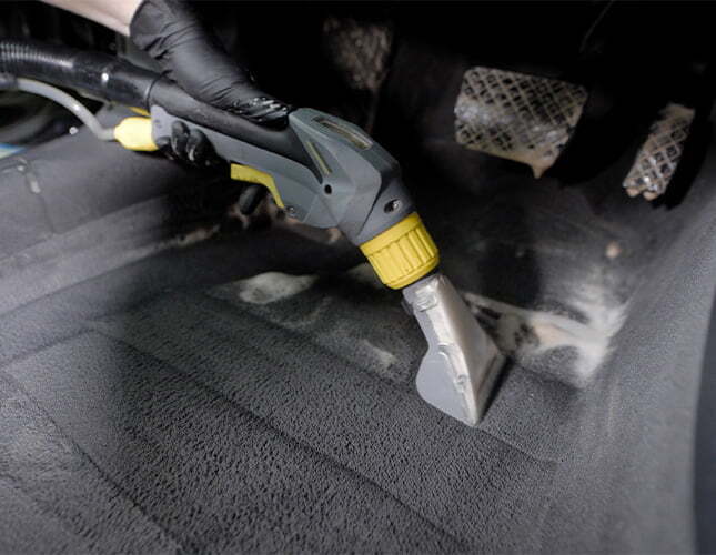 vacuuming car carpet