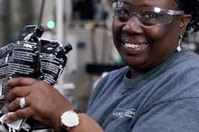 Lady with eye protection smiling to the camera