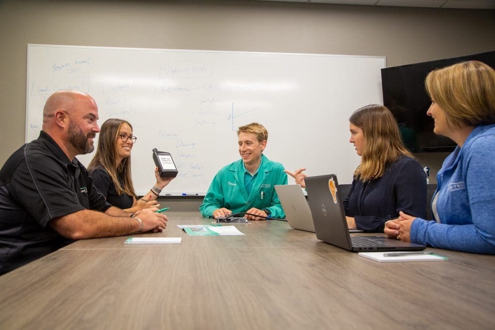 Group of lubetech employees collaborating