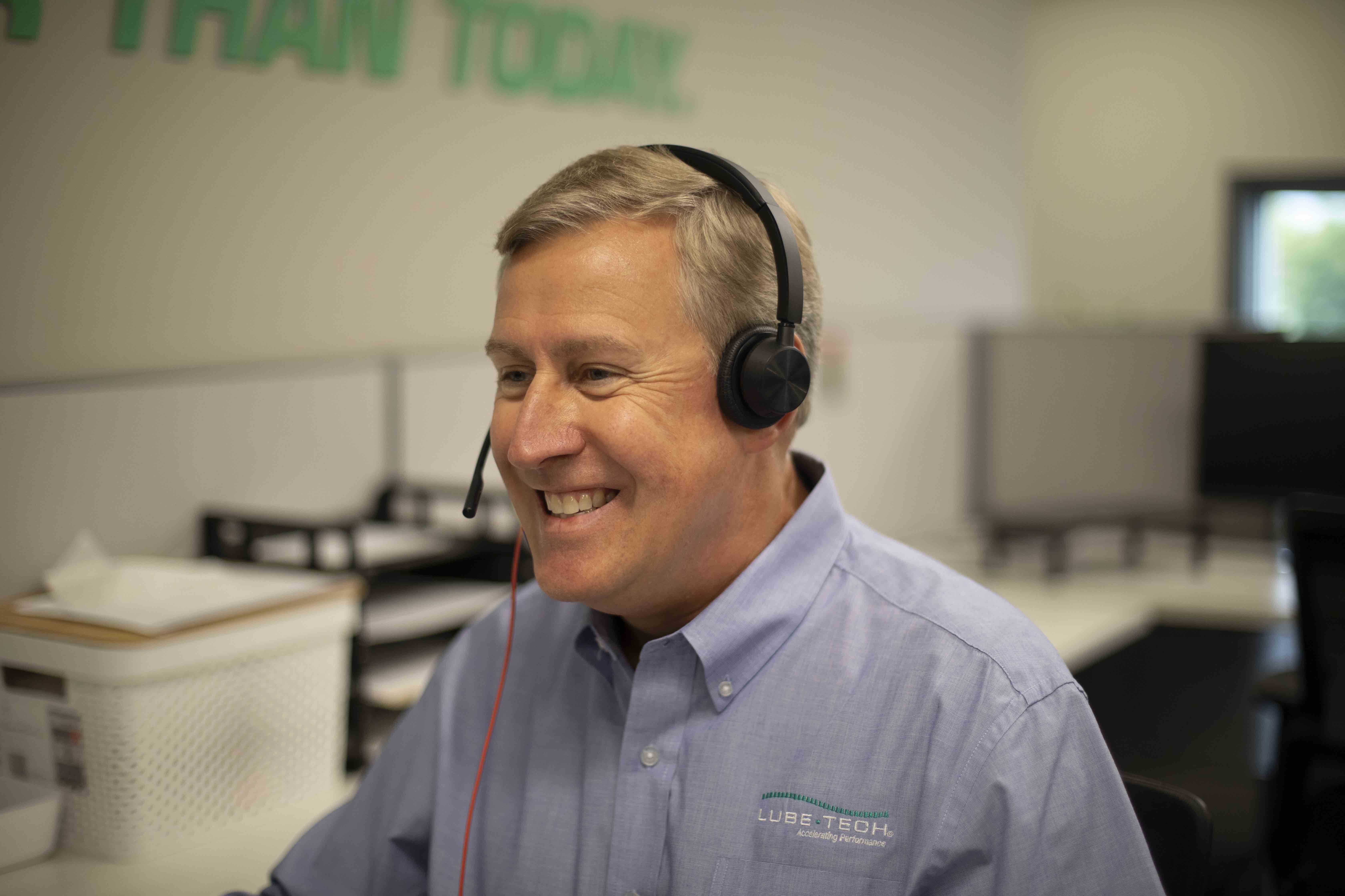 Lubetech customer support agent chatting with a customer over the phone