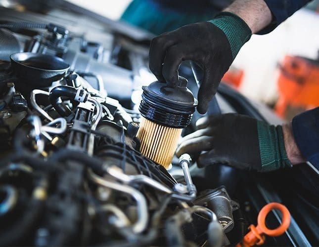 Changing an oil filter on an engine