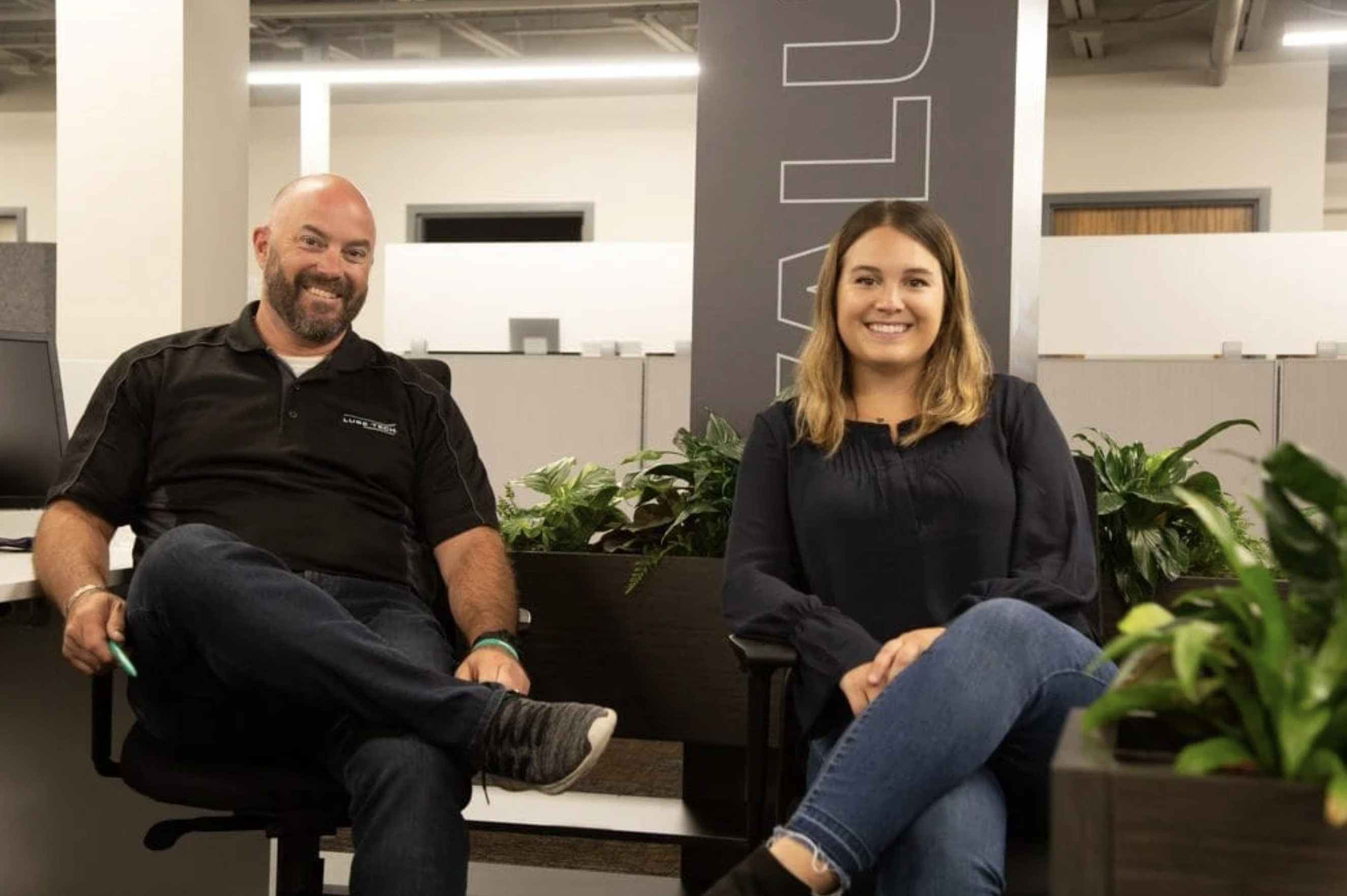 Two lubetech employees smiling