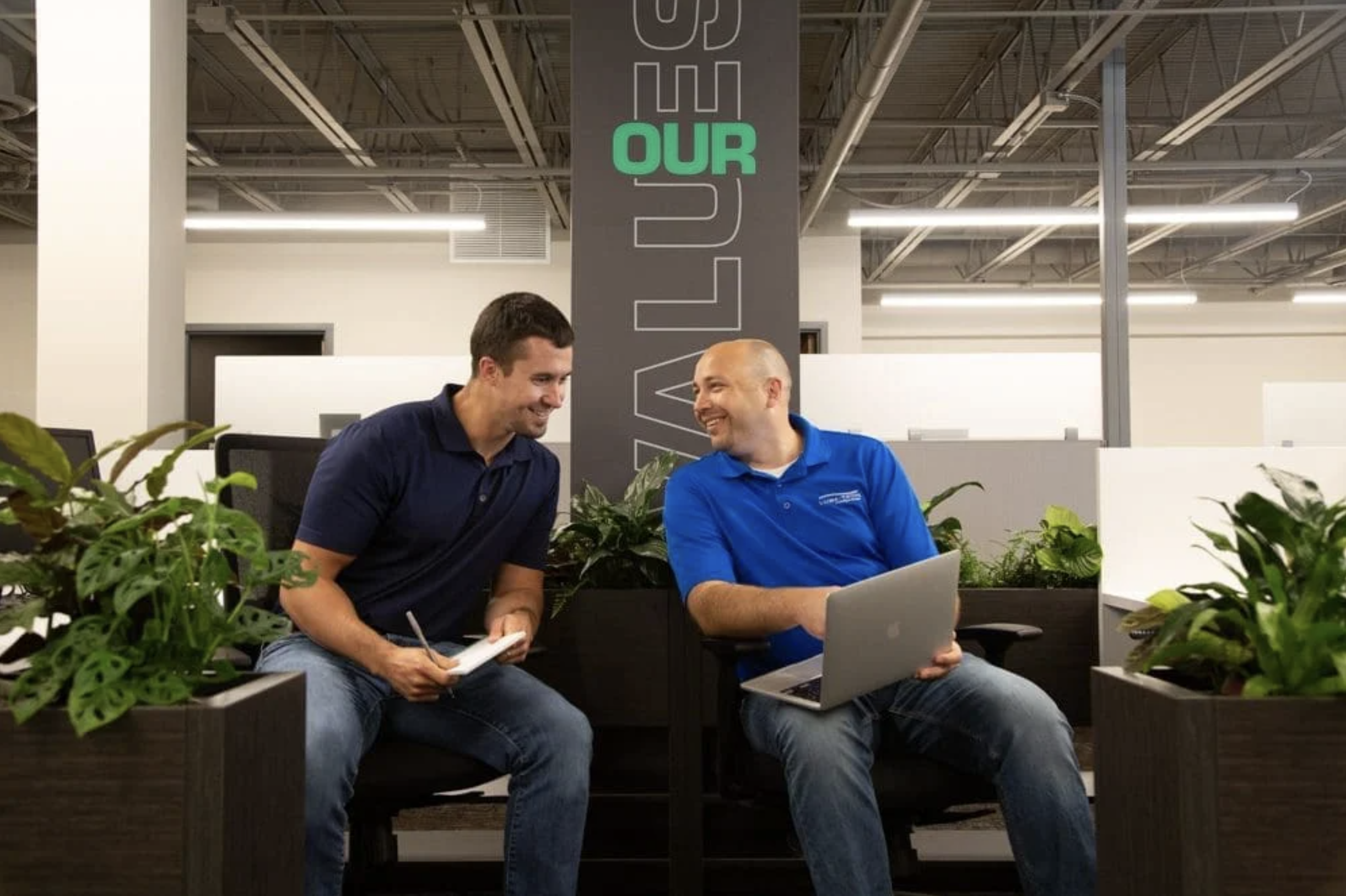 Two lubetech employees collaborating