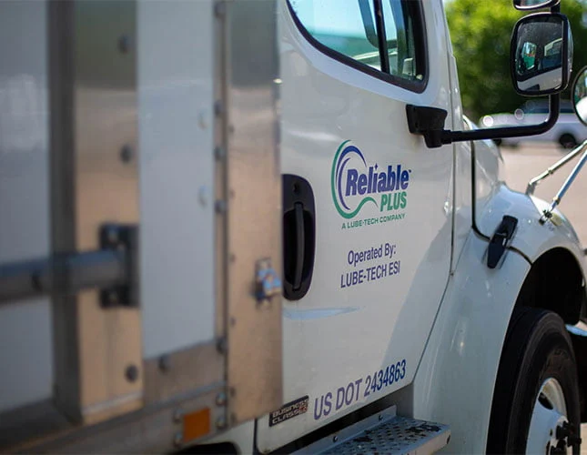 Reliable plus decal on the passenger door of a truck