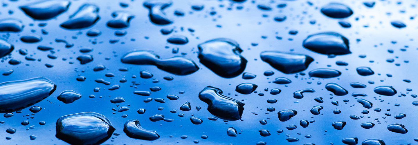 water drops on reflective surface