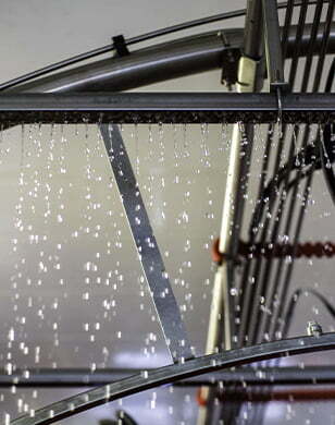 Clear liquid dripping from car wash equipment