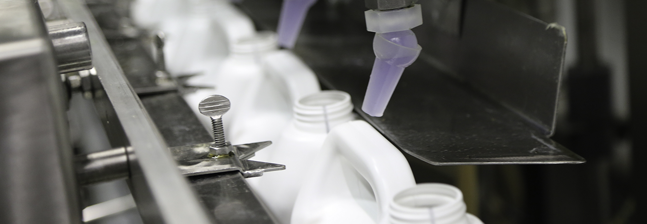 Production line filling containers with chemicals
