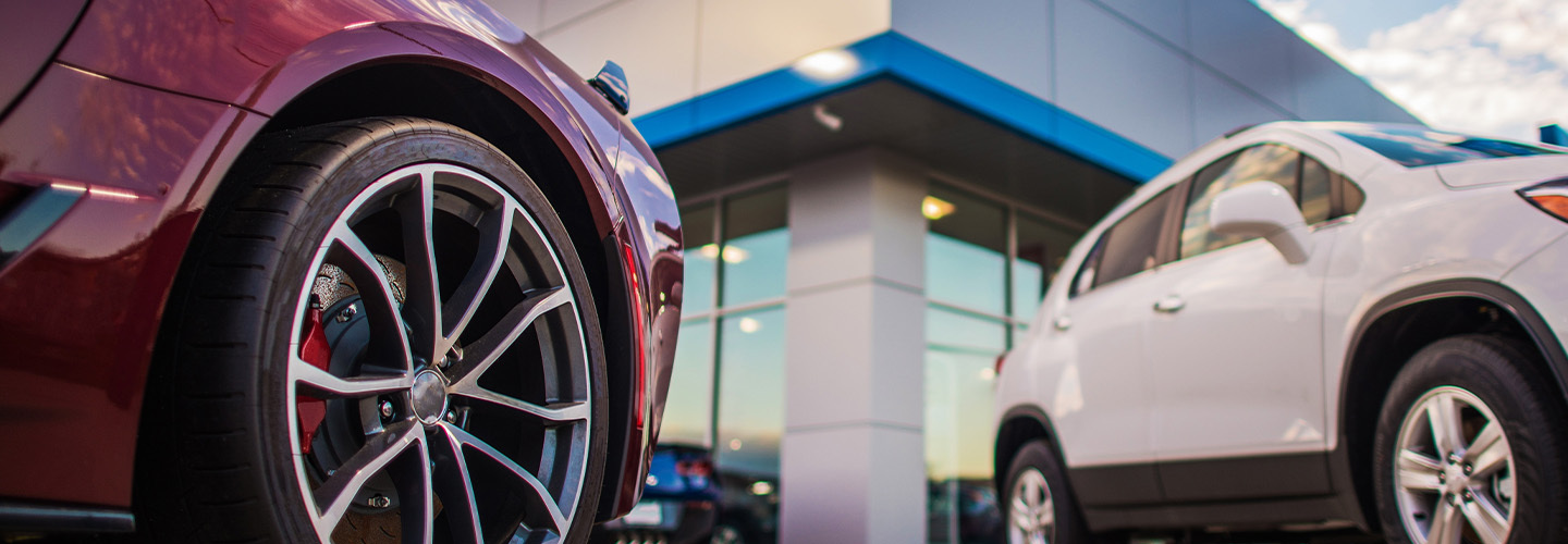 Auto dealer with cars in front