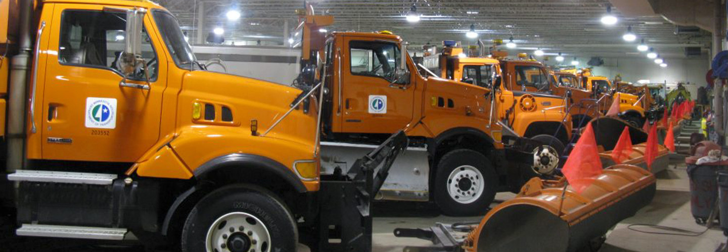 a row of yellow trucks
