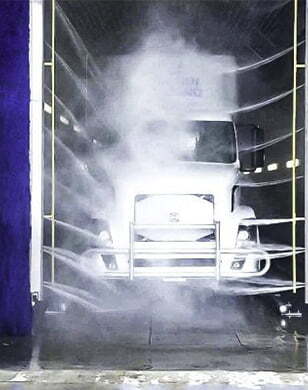 semi truck going through a wash
