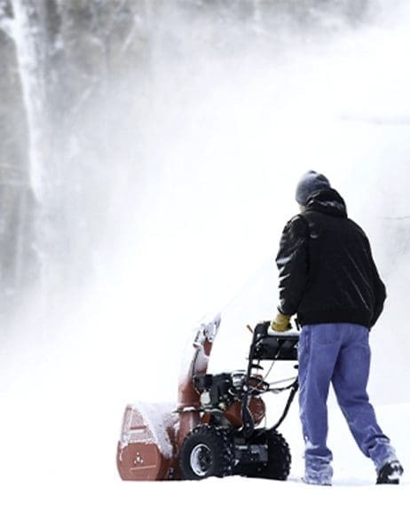 Man clearing snow