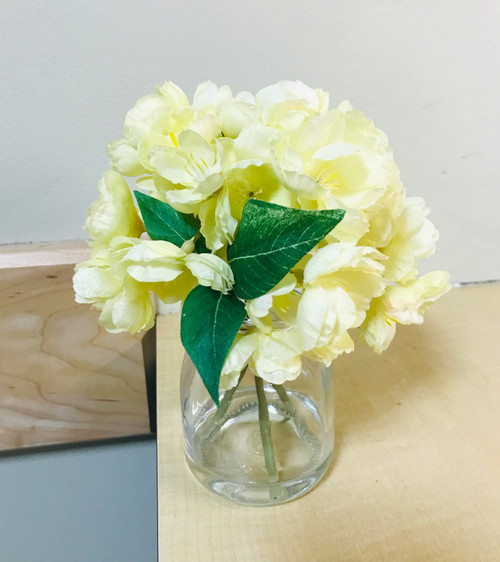 Artificial Yellow Cherry Blossoms In a Clear Glass Container