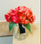 Dark Pink Cherry Bloosoms in a Glass Container