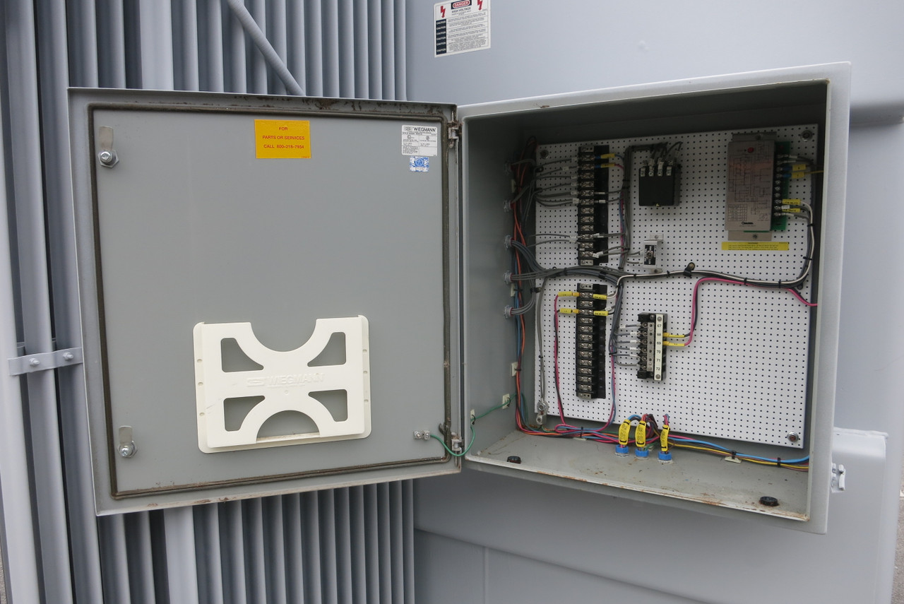 GE 5000-7000 kVA 13800 Delta 2400Y/1386 Pad Mount Oil Transformer 1684A @ 2400 V (PM3199-1)