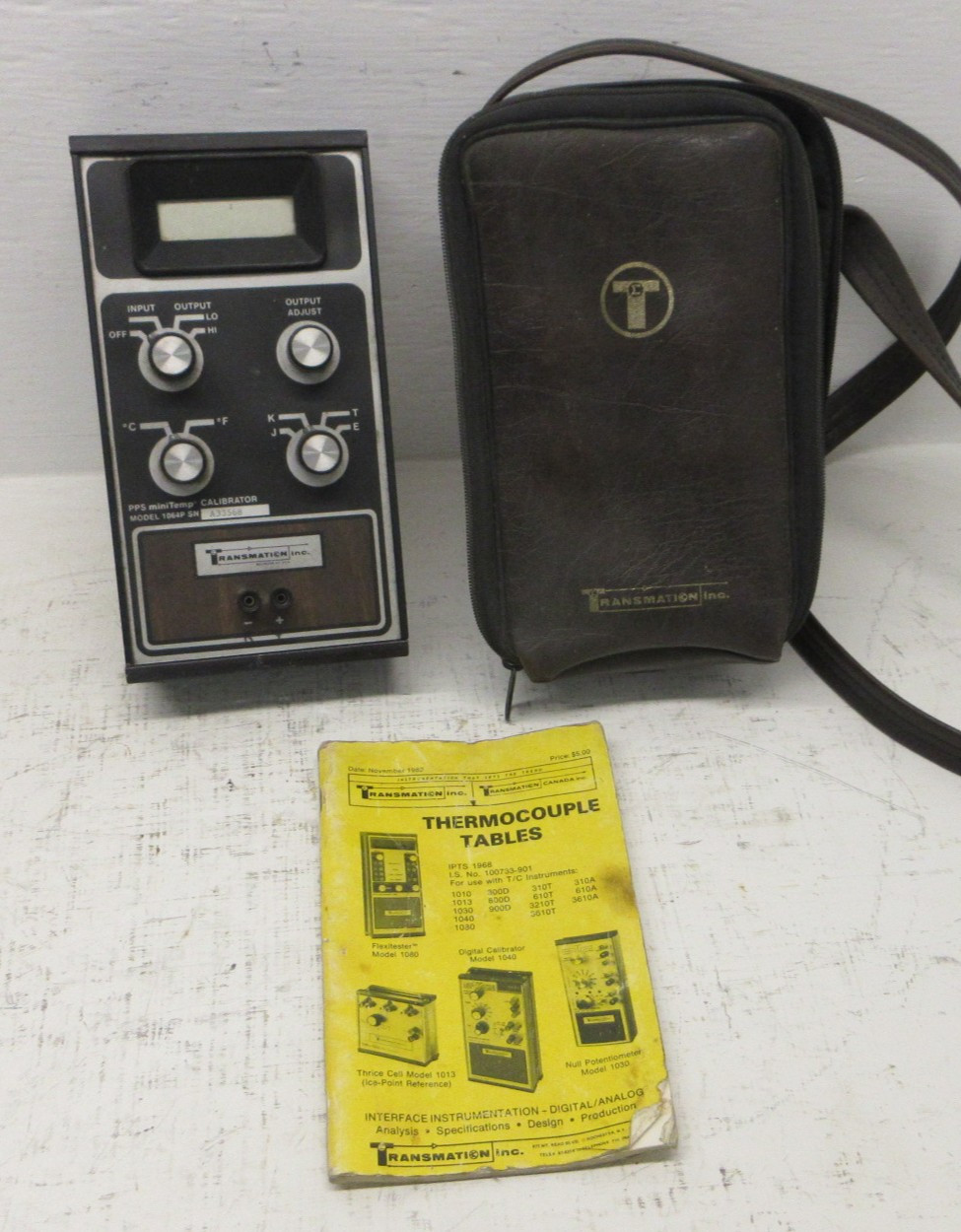 Image of Transmation Inc PPS miniTemp Thermocouple Calibrator Model 1064P w/ Leather Case