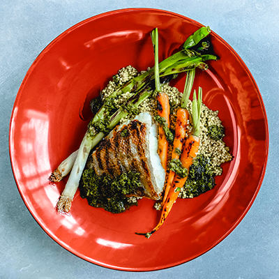 Charred cod with millet, roasted carrots and salsa verde