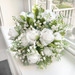 Round White Wedding Bouquet for the Bride created by The Brides Bouquet.