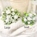 Round White Wedding Bouquet for bridesmaids created by The Brides Bouquet.