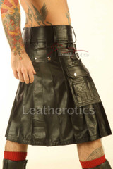 Side profile of men's wraparound leather kilt with pleated panels and double buckle closure
