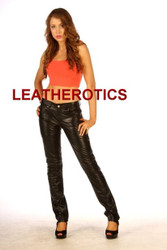 Women's black leather jeans styled with heels for a chic look