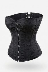 Close-up of black satin fabric with subtle brocade pattern