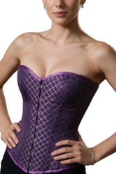 Close-up of purple brocade fabric with floral pattern and satin finish