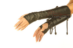 Elegant long fingerless gloves in black leather with lace-up fastening. A gothic-inspired accessory perfect for fetish, burlesque, or lingerie fashion.