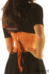 Back view of gold brocade waist trainer with adjustable lace-up fastening