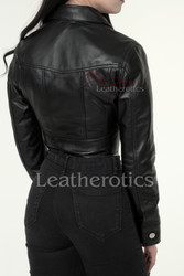 Tailored cropped women’s leather jacket in smooth black leather. Ideal for pairing with jeans, skirts, or layered outfits.