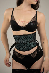 Fashion shot of the Fan Lacing Corset Waist Belt Trainer worn over a dress, illustrating its versatility as both a functional waist shaper and a stylish accessory.
